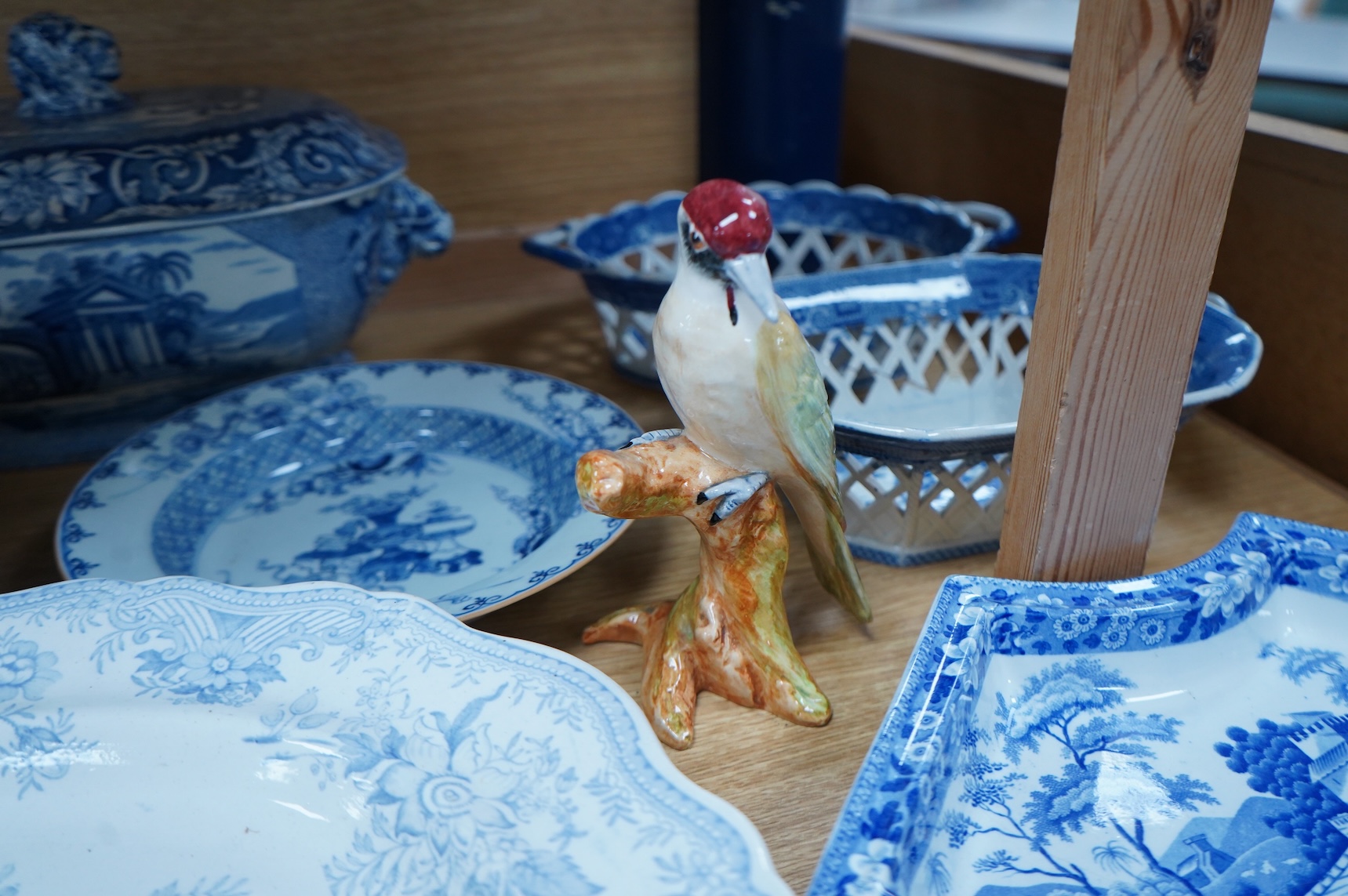 A group of Victorian blue-printed dinner wares, including a Chinese blue and white dish and a Wade bird (13).